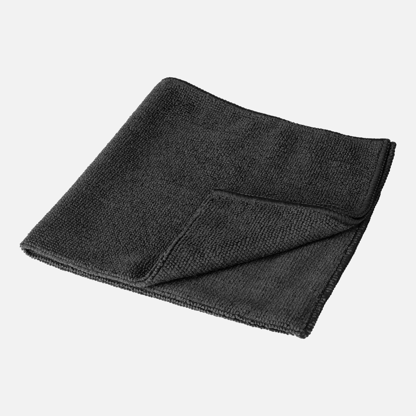 Folded black microfibre cloth for cleaning, drying, or polishing. Highly absorbent material.