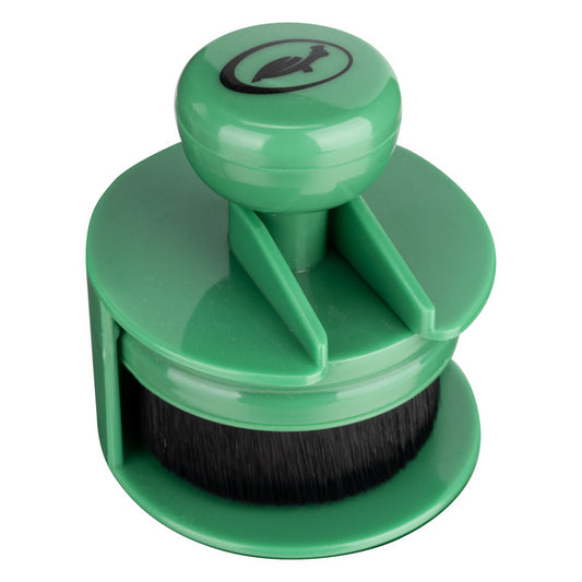 Here's a description following all the constraints:
Green Turtle Wax tyre applicator featuring a bristle brush, designed for dressing application.