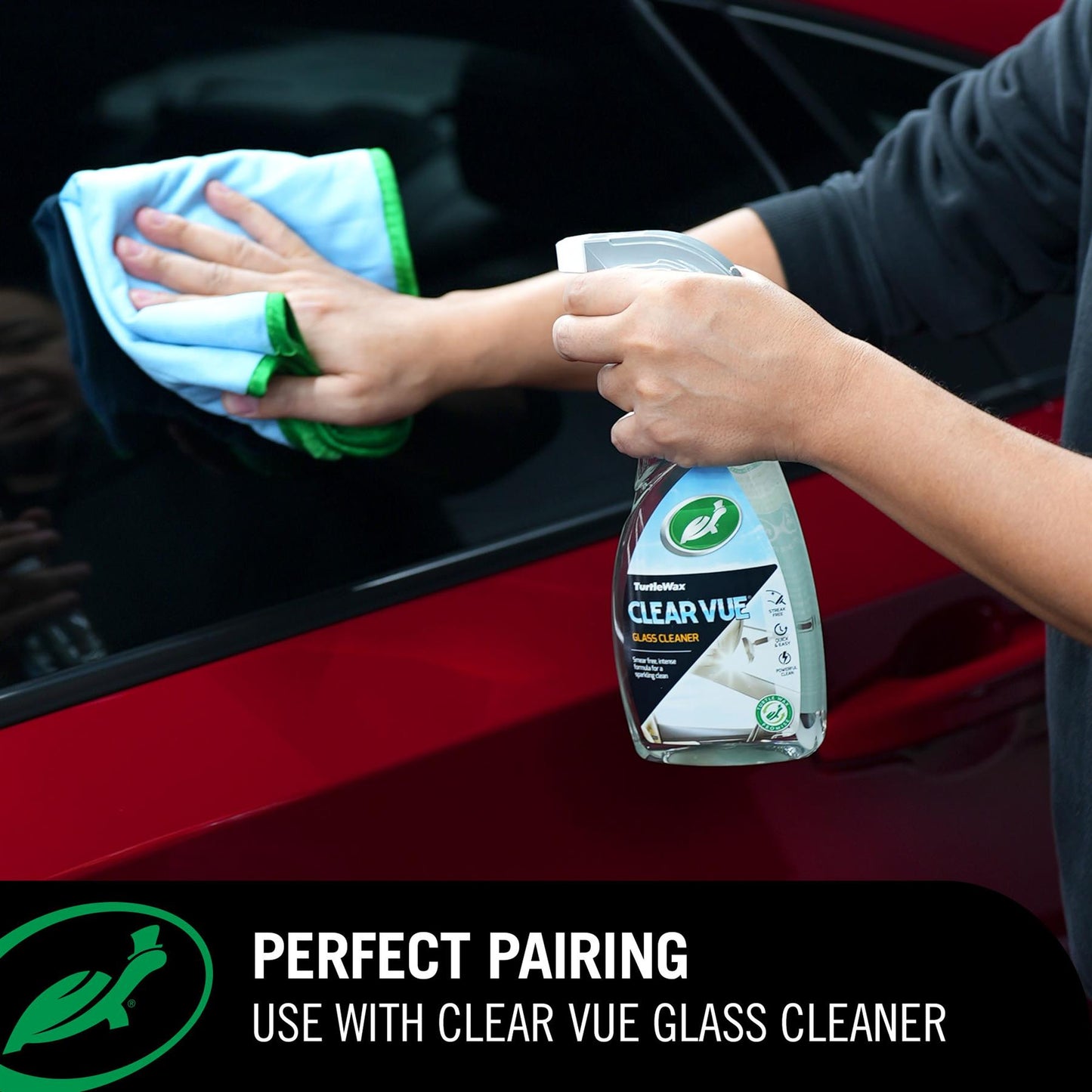 Person using Clear Vue glass cleaner with a  Clear Vue Dual Action Glass Towel  on a car interior.