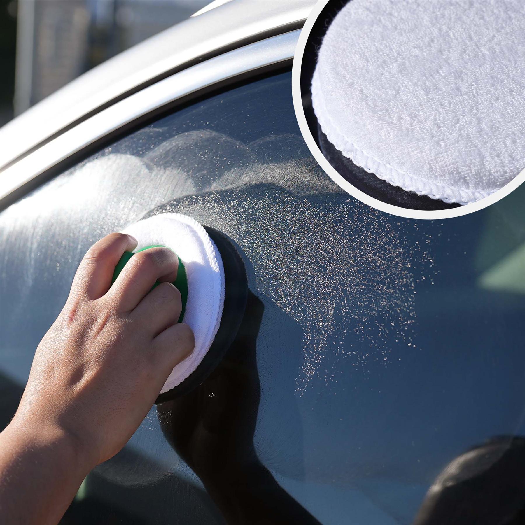 Person cleaning car window with a sponge and a close-up of the sponge with soap.