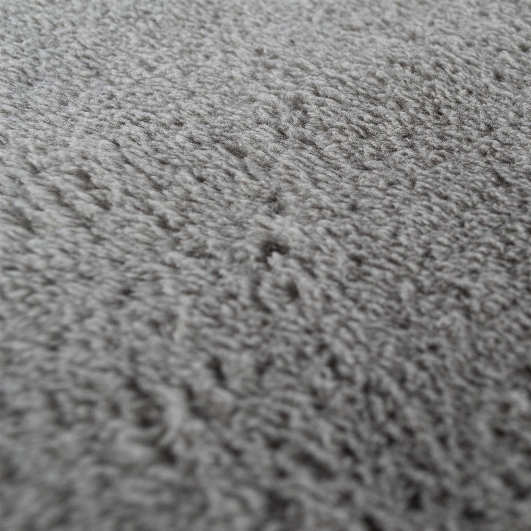 Close-up of a grey microfibre cloth. Soft textile for cleaning and detailing.