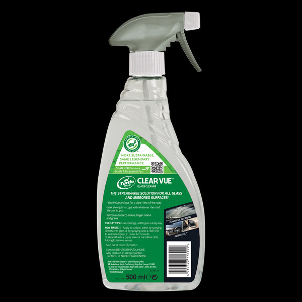 Clear-Vue Glass Cleaner spray bottle placed on a granite counter beside a sink and a potted plant in the background.