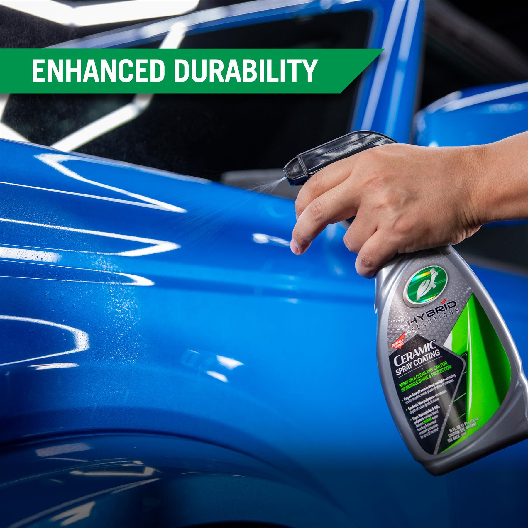 Ceramic spray coating being applied. The Turtle Wax Hybrid Solutions bottle promises incredible shine and protection for your motor.