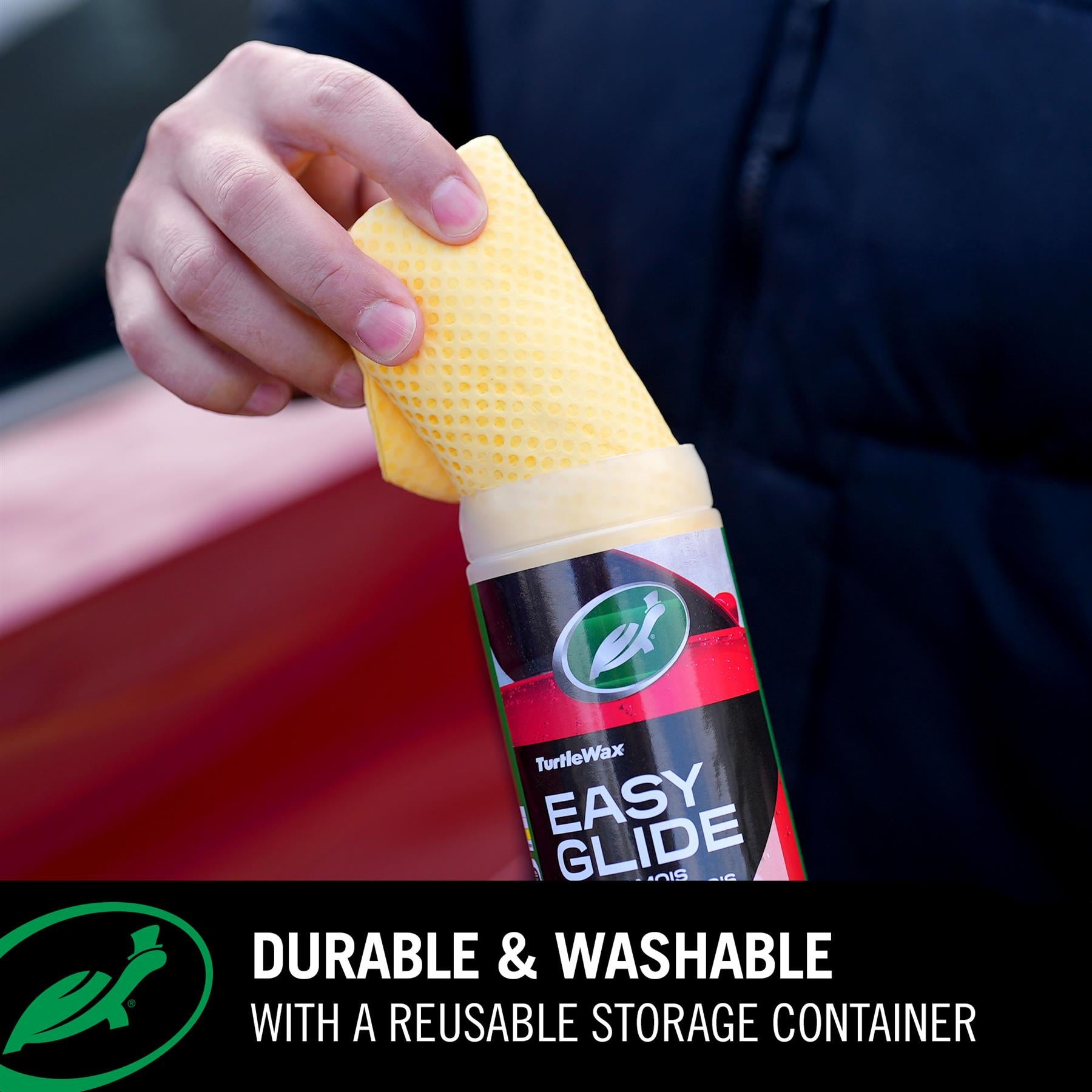 Hand holding a Turtle Wax Easy Glide Chamois