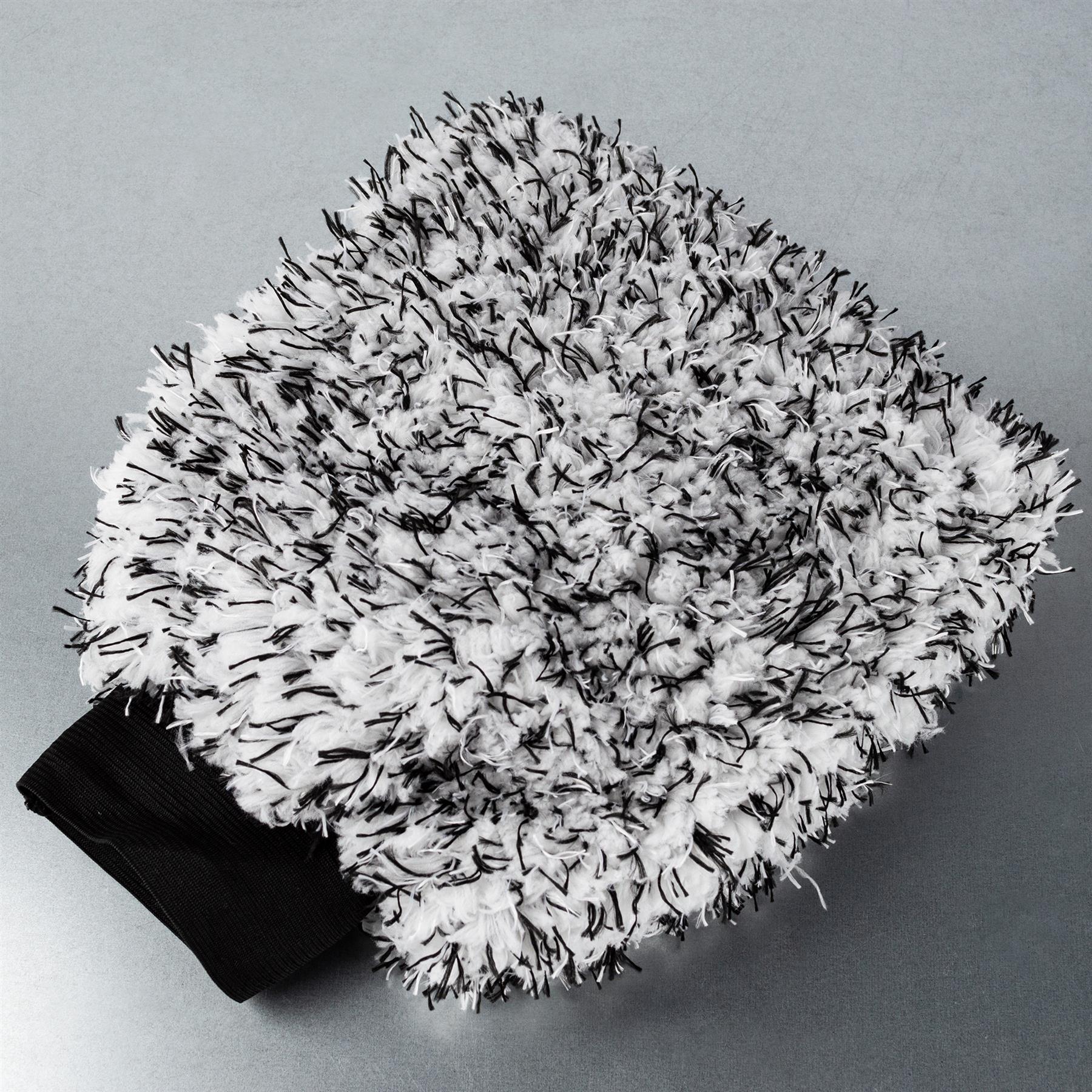 Fluffy microfibre car wash mitt with black and white strands. Soft, absorbent, and durable. Perfect car detailing accessory.
