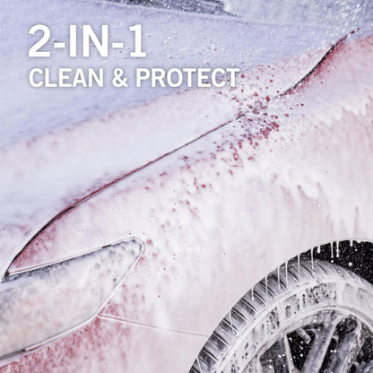 Foamy wash on red vehicle. 2-in-1. Car detailing for paintwork cleaning & protection. Soap suds.
