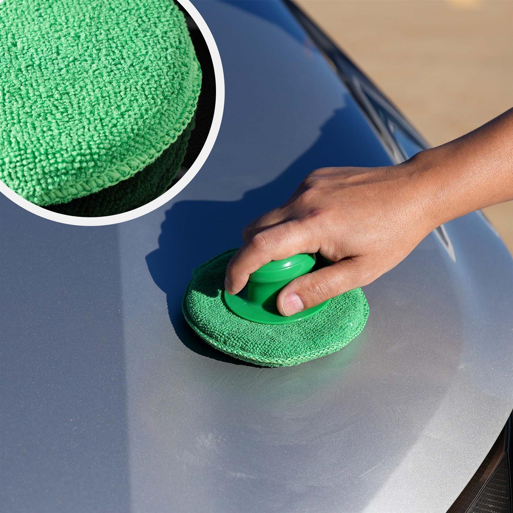 Person using a green car polishing pad on a car surface with a close-up of the pad.