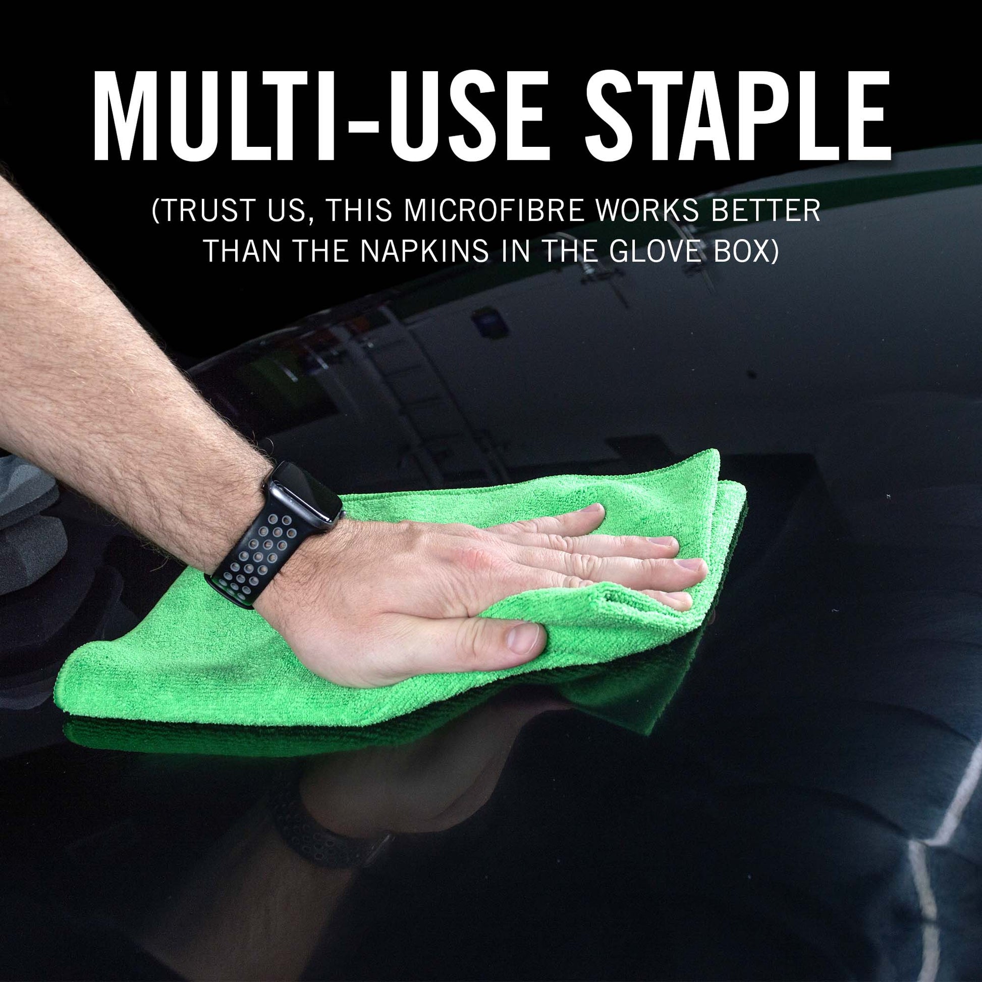 Person cleaning a car with a green microfiber towel, text indicating its multi-use nature.