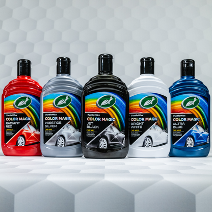 Selection of Turtle Wax Color Magic car wax bottles. Radiant Red, Prestige Silver, Jet Black, Bright White and Ultra Blue.
