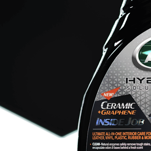Animated demonstration of HS Inside Job interior cleaner removing dust and grime from dashboard and console surfaces with ease.