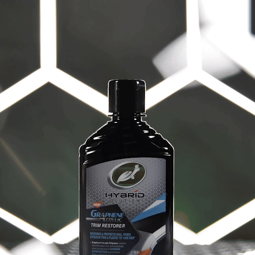 Turtle Wax Hybrid Solutions Graphene Acrylic trim restorer in a black bottle. Exterior car detailing product.