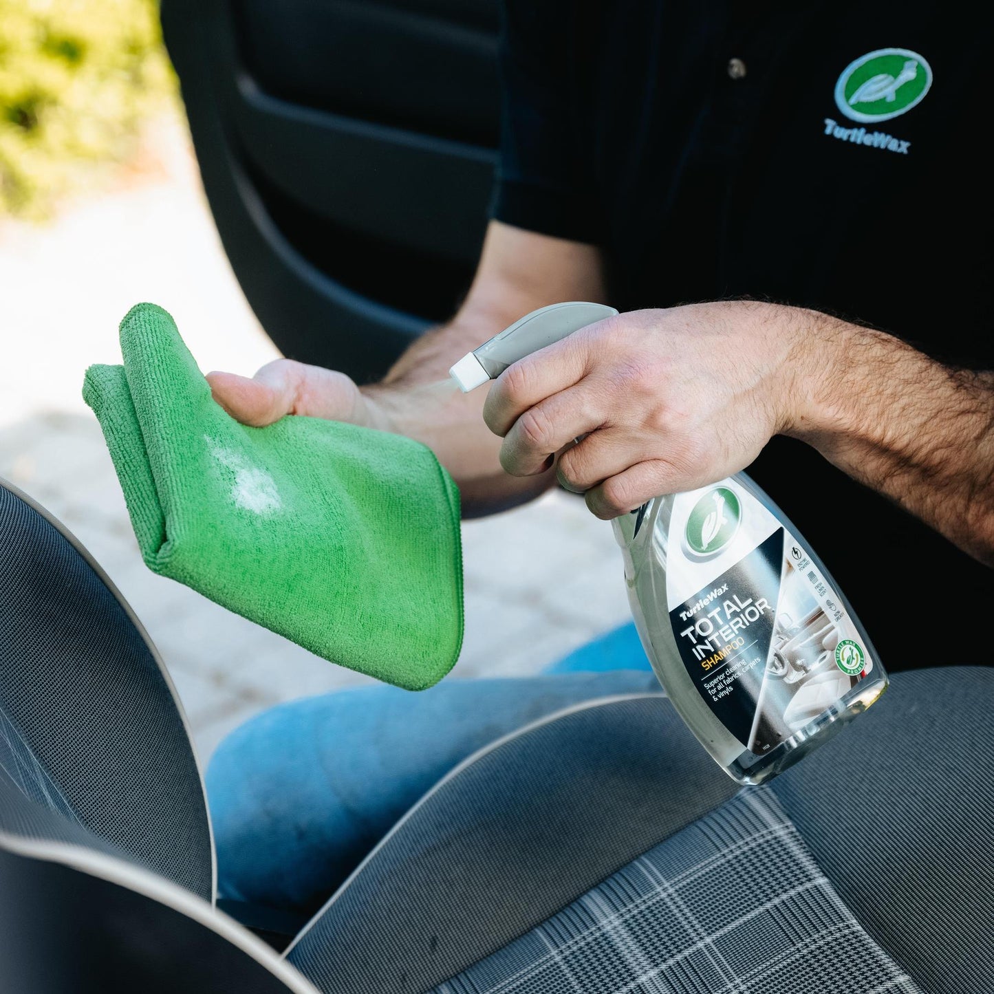 Detailing car interior. Turtle Wax interior shampoo and microfibre cloth, for all fabrics, carpets and vinyls. Car care.