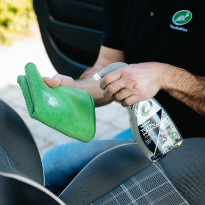 Detailing car interior. Turtle Wax interior shampoo and microfibre cloth, for all fabrics, carpets and vinyls. Car care.