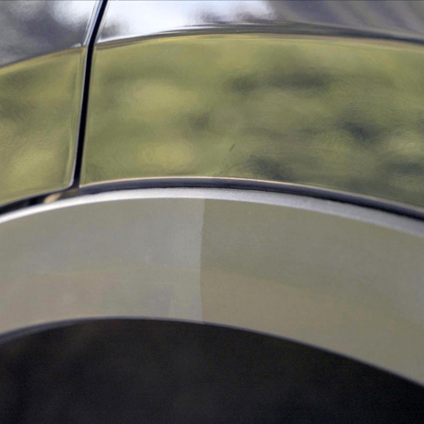 Car detailing: A car's trim before and after application of Turtle Wax trim restorer. Restored plastic is shiny.
