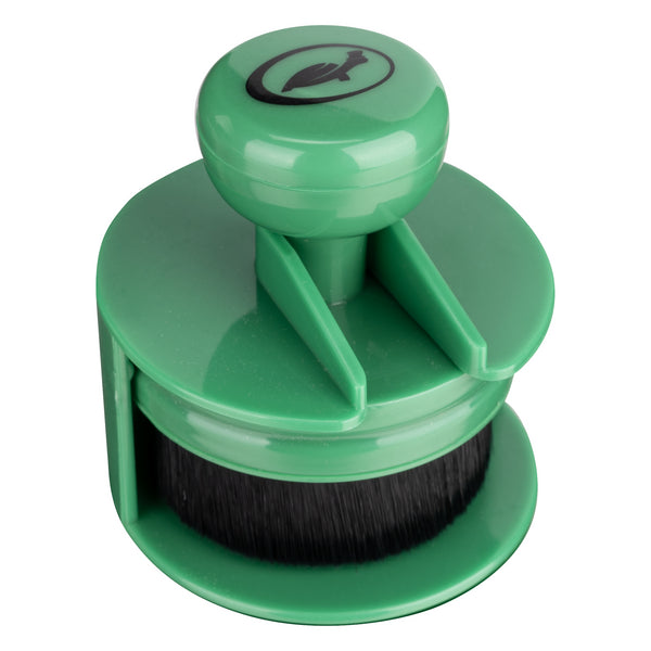 Here's a description following all the constraints:

Green Turtle Wax tyre applicator featuring a bristle brush, designed for dressing application.