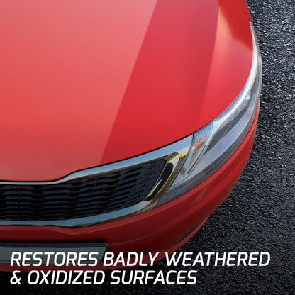 Bright red car bonnet. Turtle Wax heavy duty formula restores weathered and oxidised paintwork. For paint correction, fading, and swirl mark removal.