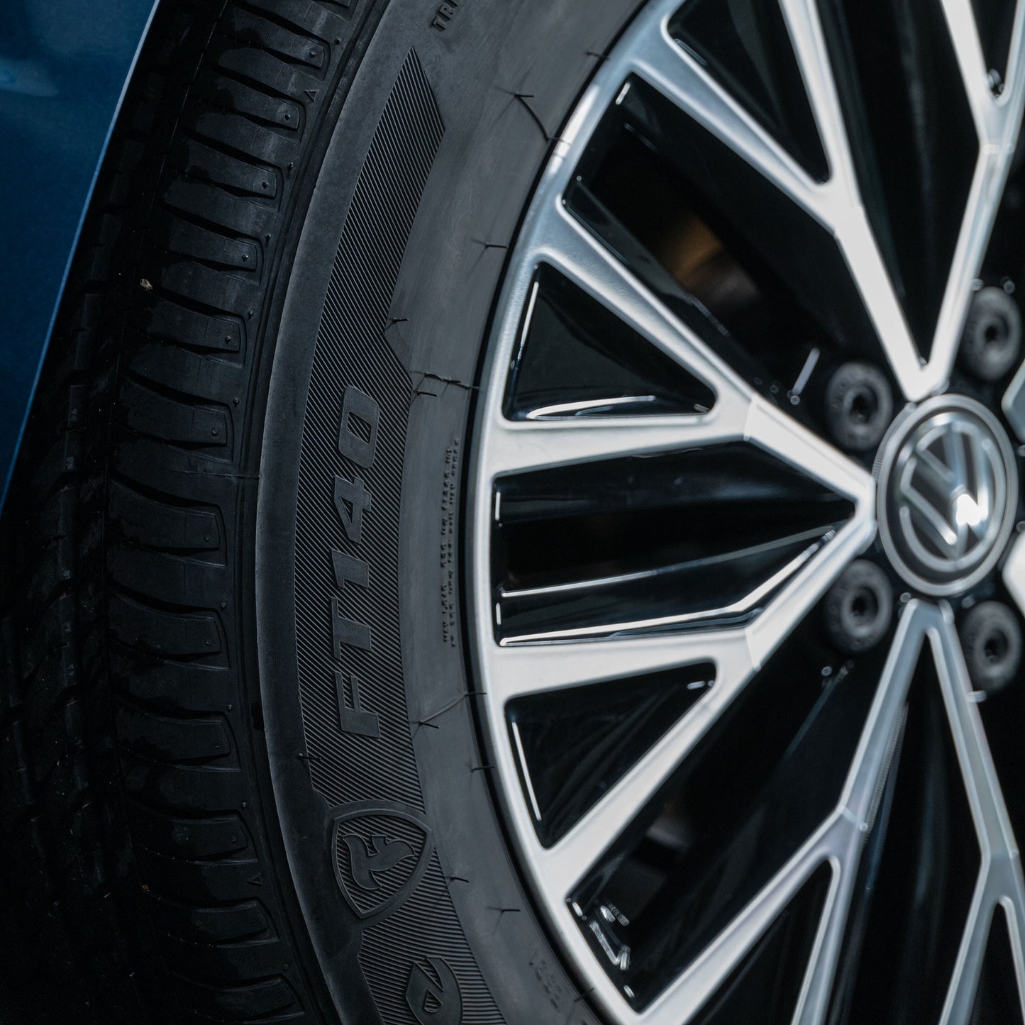 Close-up of a car tyre with a sleek, modern wheel. Turtle Wax maintains the look.

