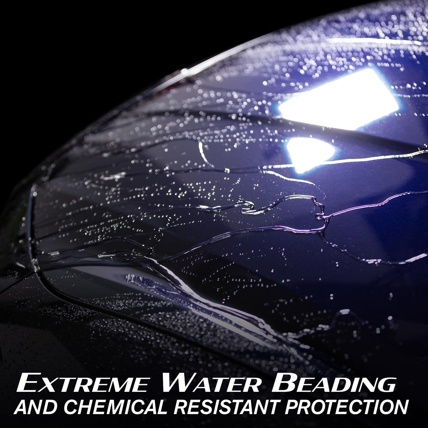 Water beading on a blue car bonnet, showcasing Turtle Wax Hybrid Solutions car care protection in a close-up.