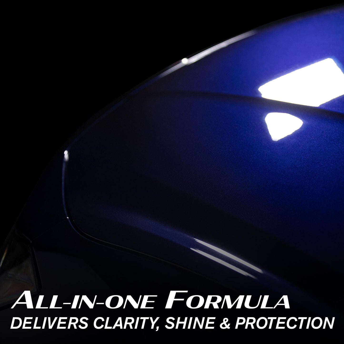 Glossy, deep blue car paint with light reflections. All-in-one Turtle Wax formula delivering clarity, shine and protection.